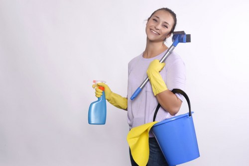 Technician checking a carpet cleaning area for hazards